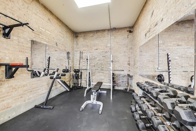1800 W Roscoe St Unit 432, Chicago, IL 60657 - gym featuring brick wall and a high ceiling