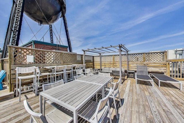1800 W Roscoe St Unit 432, Chicago, IL 60657 - wooden deck featuring outdoor dining area