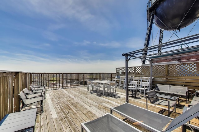 1800 W Roscoe St Unit 432, Chicago, IL 60657 - deck featuring outdoor dining space