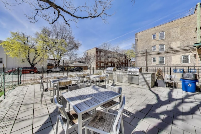 1800 W Roscoe St Unit 432, Chicago, IL 60657 - view of patio / terrace featuring outdoor dining space