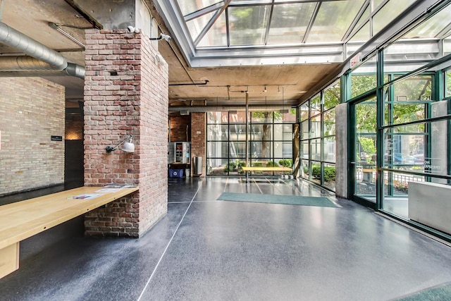 1800 W Roscoe St Unit 432, Chicago, IL 60657 - building lobby with expansive windows and brick wall