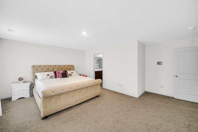 bedroom with carpet flooring and baseboards