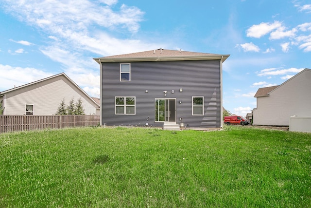 rear view of property featuring entry steps