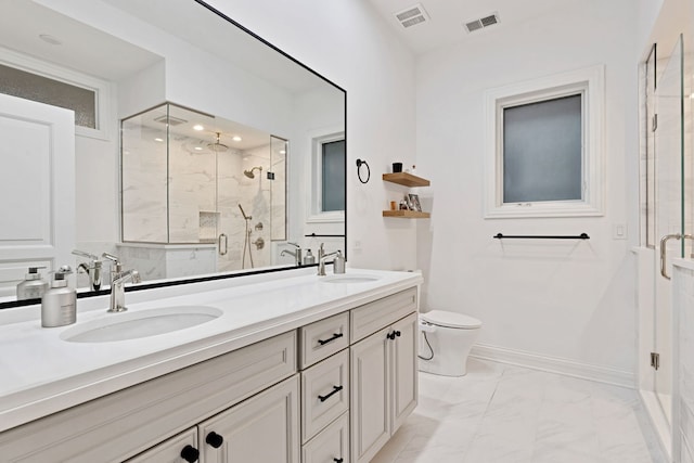 1359 W Fullerton Ave Unit 2E, Chicago, IL 60614 - bathroom with double vanity, a marble finish shower, marble look tile flooring, toilet, and recessed lighting