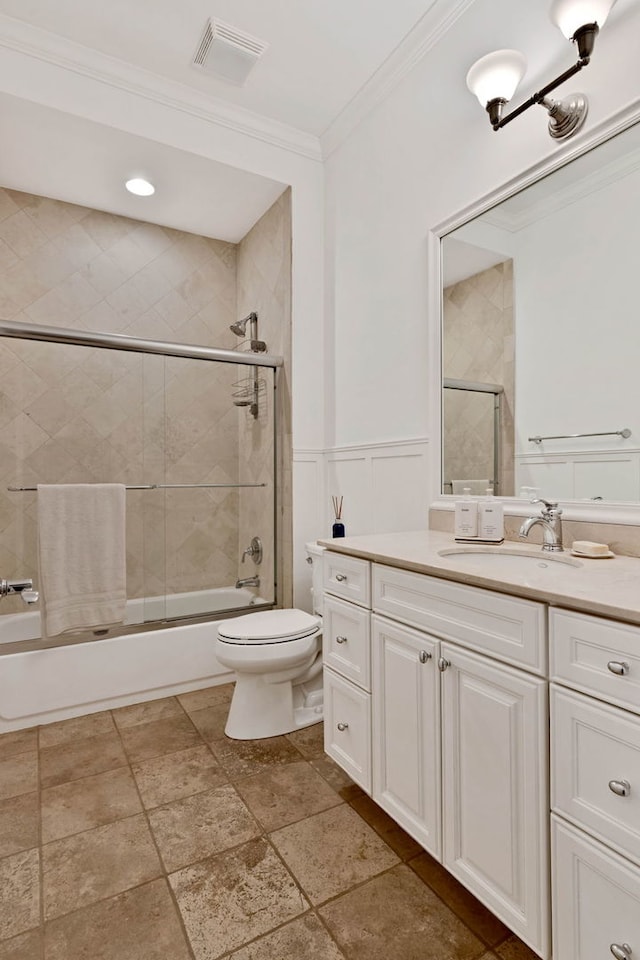 1359 W Fullerton Ave Unit 2E, Chicago, IL 60614 - full bath with vanity, enclosed tub / shower combo, crown molding, toilet, and stone tile floors