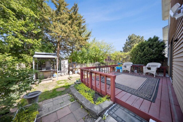 2121 Pepperwood Ln Unit 0, Glendale Heights, IL 60139 - wooden terrace with a fenced backyard and a gazebo