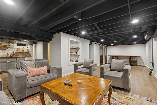 431 Elm Ave, Geneva, IL 60134 - living room with wet bar, wood finished floors, and baseboards