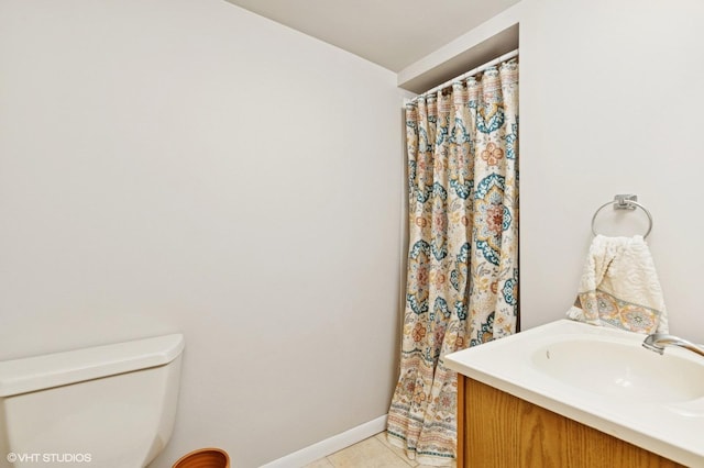 431 Elm Ave, Geneva, IL 60134 - bathroom featuring a sink, tile patterned floors, toilet, and a shower with curtain
