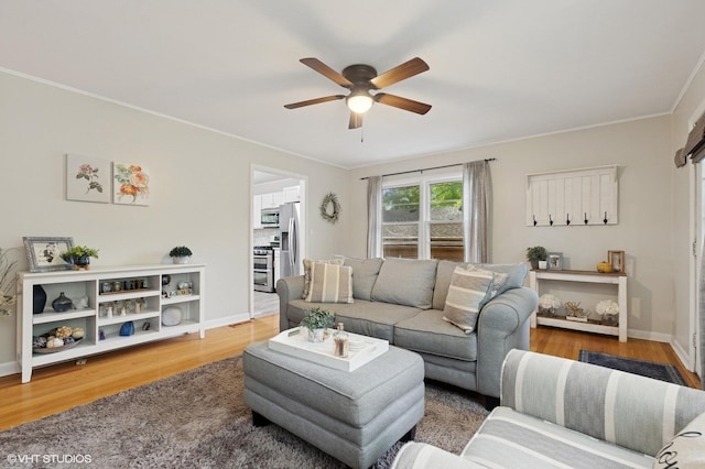 431 Elm Ave, Geneva, IL 60134 - living room featuring a ceiling fan, wood finished floors, crown molding, and baseboards
