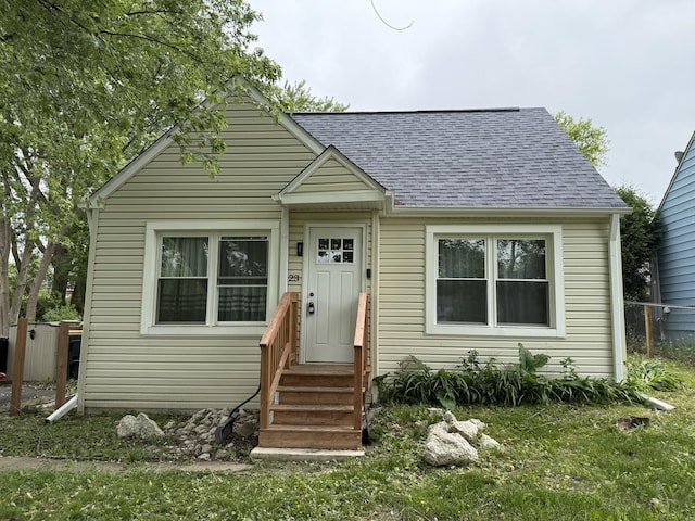 1623 Beverly Dr, Round Lake Beach, IL 60073 - bungalow-style home with roof with shingles and entry steps