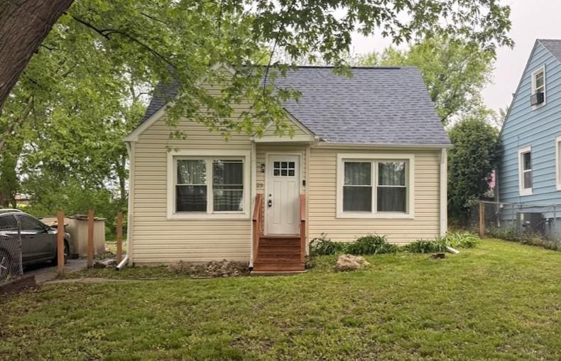 1623 Beverly Dr, Round Lake Beach, IL 60073 - view of front of home with entry steps and roof with shingles