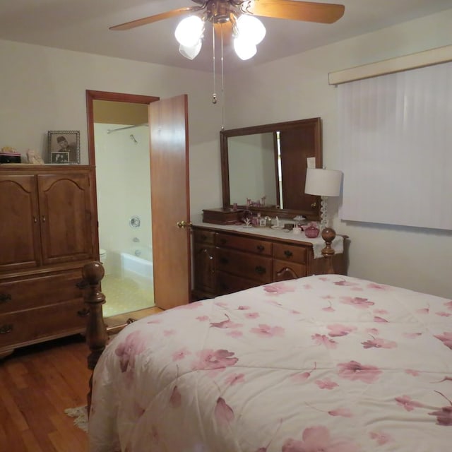 206 Vermont St, Momence, IL 60954 - bedroom featuring wood finished floors, ceiling fan, and ensuite bathroom