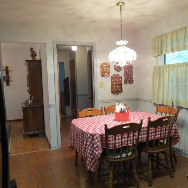 206 Vermont St, Momence, IL 60954 - dining area featuring a chandelier