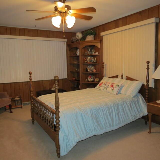 206 Vermont St, Momence, IL 60954 - bedroom featuring carpet floors, wooden walls, and a ceiling fan