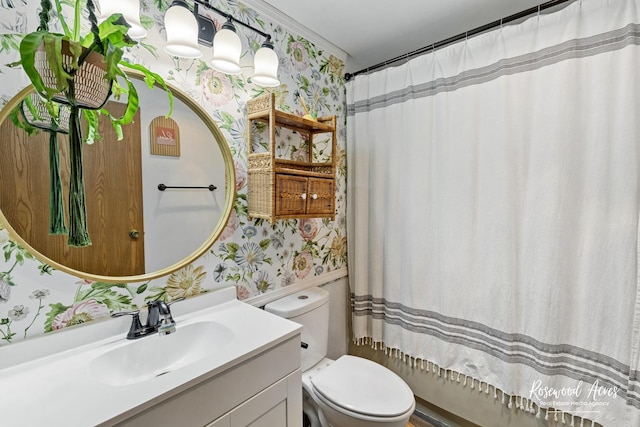 125 E Second S St, Chebanse, IL 60922 - full bathroom with wallpapered walls, vanity, toilet, and a shower with shower curtain