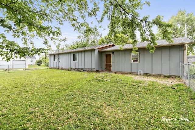 125 E Second S St, Chebanse, IL 60922 - rear view of property featuring board and batten siding and a shingled roof