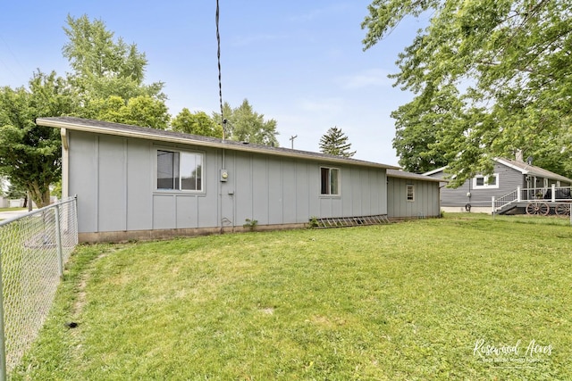 125 E Second S St, Chebanse, IL 60922 - rear view of property featuring board and batten siding