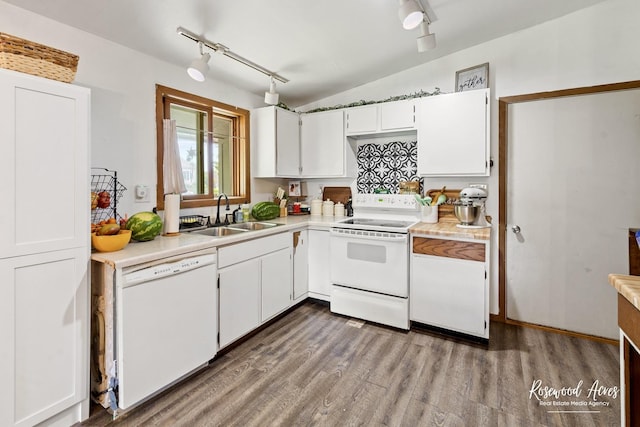 125 E Second S St, Chebanse, IL 60922 - kitchen with white appliances, a sink, track lighting, light countertops, and wood finished floors
