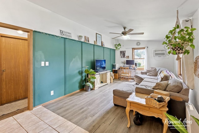 125 E Second S St, Chebanse, IL 60922 - living area featuring a ceiling fan, a wall mounted air conditioner, light wood finished floors, and an office area