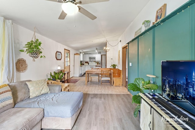 125 E Second S St, Chebanse, IL 60922 - living area featuring light wood-type flooring, ceiling fan, vaulted ceiling, and a chandelier