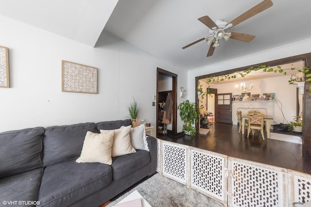 5351 N Kimball Ave, Chicago, IL 60625 - living room with a ceiling fan, a chandelier, and wood finished floors