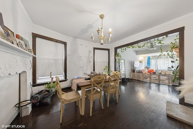 5351 N Kimball Ave, Chicago, IL 60625 - dining area with a chandelier, dark wood-type flooring, and ornamental molding