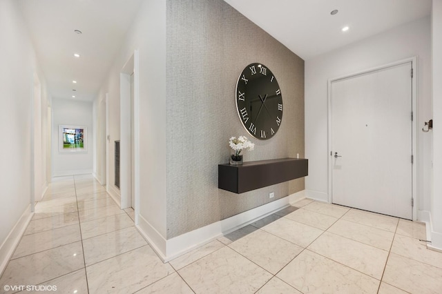 400 W Huron St Unit 1001, Chicago, IL 60654 - foyer featuring recessed lighting, an accent wall, and baseboards