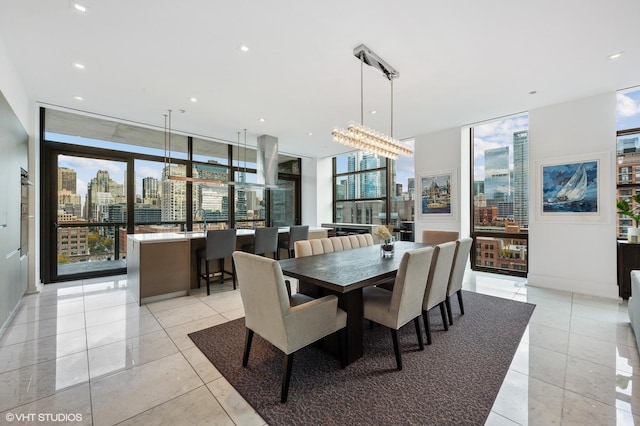 400 W Huron St Unit 1001, Chicago, IL 60654 - dining space with expansive windows, plenty of natural light, a city view, light tile patterned floors, and recessed lighting
