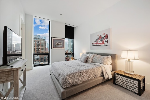 400 W Huron St Unit 1001, Chicago, IL 60654 - bedroom featuring carpet floors, a city view, and floor to ceiling windows