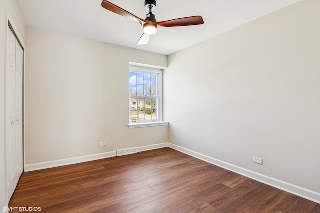 2028 Creekside Dr, Wheaton, IL 60189 - unfurnished bedroom featuring a closet, wood finished floors, baseboards, and ceiling fan