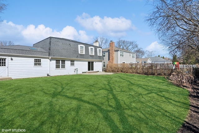 2028 Creekside Dr, Wheaton, IL 60189 - rear view of house featuring a shingled roof, a chimney, and a patio