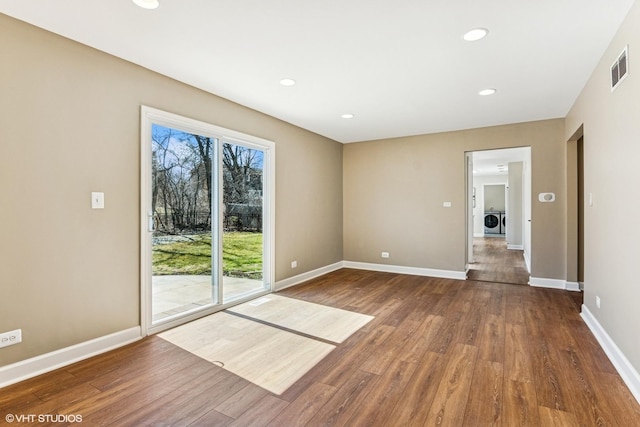 2028 Creekside Dr, Wheaton, IL 60189 - empty room with washer / clothes dryer, baseboards, wood finished floors, and recessed lighting