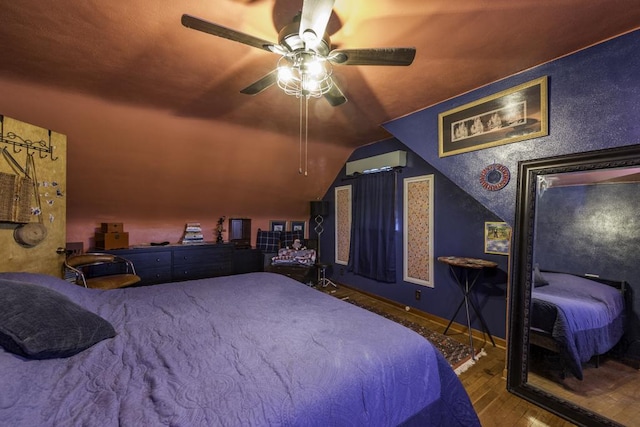 1311 Eastview Dr, Waukegan, IL 60085 - bedroom with an AC wall unit, wood finished floors, lofted ceiling, and ceiling fan