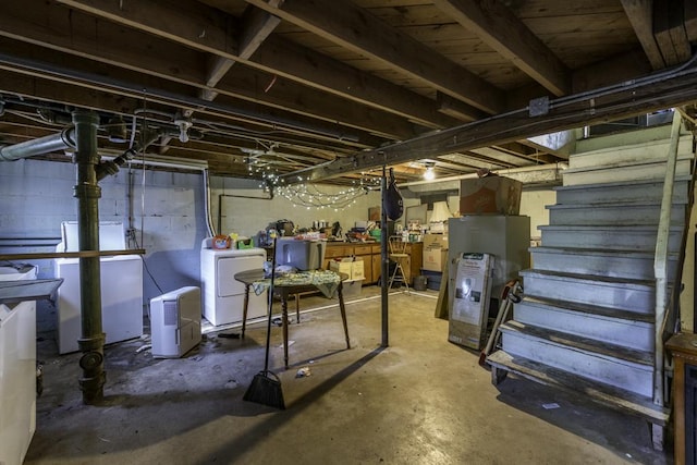 1311 Eastview Dr, Waukegan, IL 60085 - unfinished below grade area featuring separate washer and dryer, stairs, and refrigerator