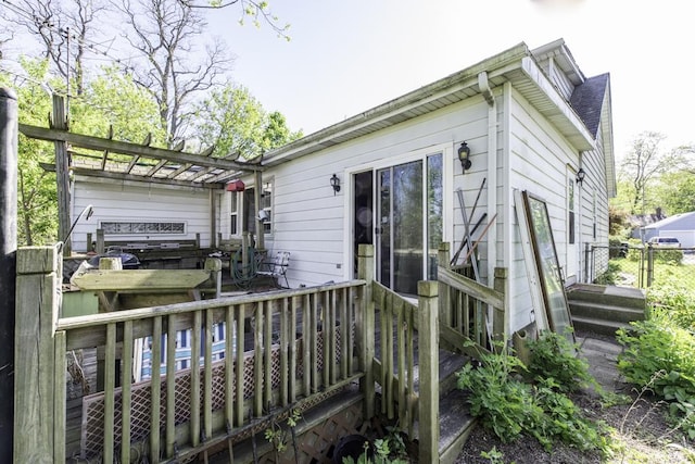 1311 Eastview Dr, Waukegan, IL 60085 - rear view of property featuring a pergola and a deck