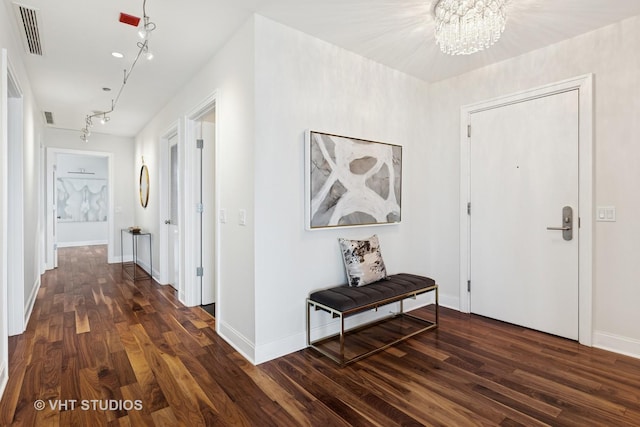 340 E Randolph St Unit 4806, Chicago, IL 60601 - hallway with wood finished floors, a chandelier, and baseboards