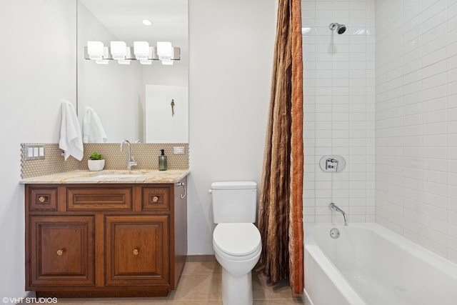 340 E Randolph St Unit 4806, Chicago, IL 60601 - bathroom featuring decorative backsplash, toilet, shower / bath combo with shower curtain, vanity, and tile patterned floors