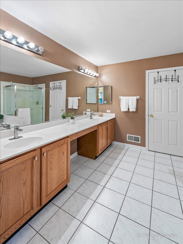 553 S Haverhill Ln, South Elgin, IL 60177 - full bathroom with double vanity, a stall shower, and tile patterned floors