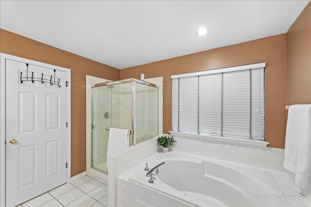 553 S Haverhill Ln, South Elgin, IL 60177 - bathroom featuring a stall shower, a bath, and tile patterned floors