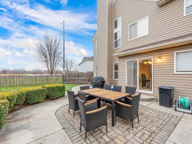 553 S Haverhill Ln, South Elgin, IL 60177 - fenced backyard with a patio area, a grill, and outdoor dining space