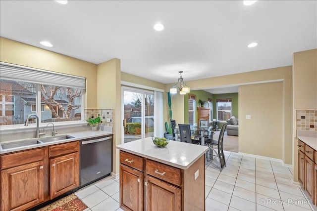 553 S Haverhill Ln, South Elgin, IL 60177 - kitchen with stainless steel dishwasher, a sink, light countertops, plenty of natural light, and recessed lighting