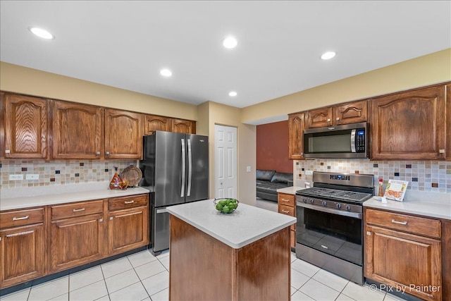 553 S Haverhill Ln, South Elgin, IL 60177 - kitchen with appliances with stainless steel finishes, light countertops, backsplash, light tile patterned flooring, and recessed lighting