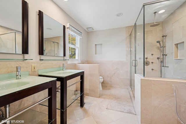 4141 Rutgers Ln, Northbrook, IL 60062 - full bath with tile walls, a shower stall, toilet, and two vanities