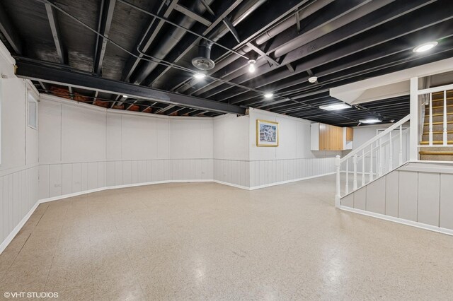4141 Rutgers Ln, Northbrook, IL 60062 - finished basement with stairway and a decorative wall