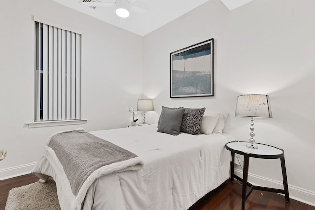 918 W 35th Pl, Chicago, IL 60609 - bedroom featuring baseboards and dark wood finished floors