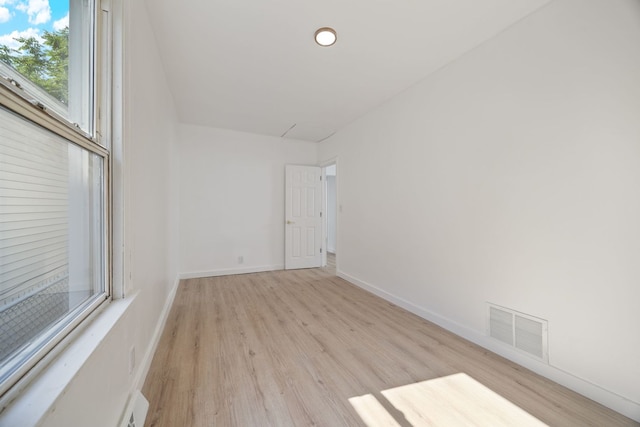 17 E 100th Pl, Chicago, IL 60628 - spare room with light wood-type flooring and recessed lighting