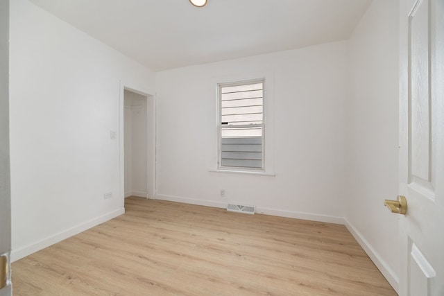 17 E 100th Pl, Chicago, IL 60628 - empty room featuring light wood finished floors and baseboards