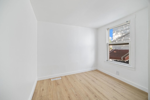 17 E 100th Pl, Chicago, IL 60628 - unfurnished room featuring light wood-type flooring and baseboards