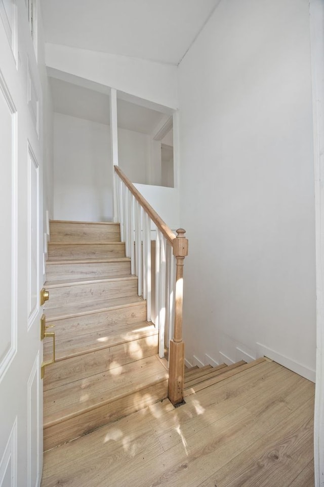17 E 100th Pl, Chicago, IL 60628 - stairway featuring wood finished floors