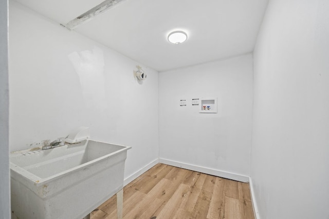 17 E 100th Pl, Chicago, IL 60628 - washroom featuring light wood-type flooring and washer hookup